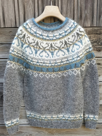 Elina | Warm sweater with soft winter details
